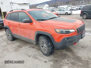 2021 Jeep Cherokee Trailhawk z VIN 1C4PJMBX7MD119790, wystawiony jako IAAI lot #41303544 z przebiegiem 39 379 mil mil oraz . Historia ofert i sprzedaży dostępna na DreamBid. Obrazek 1.