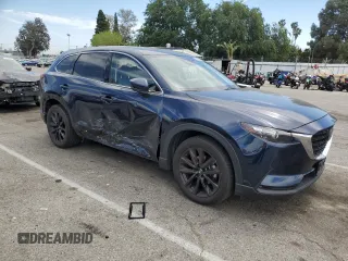 2023 Mazda CX-9 Touring Plus with VIN JM3TCBAY1P0649490, listed as a Copart auction lot 52217915 with 20,716 mi miles and Salvage title. Bid and sale history available at DreamBid. Image 4.