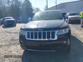 2013 Jeep Grand Cherokee Overland with VIN 1C4RJECG7DC644822, listed as a IAAI auction lot 41658872 with 156,838 mi miles. Bid and sale history available at carsss.com. Image 12.
