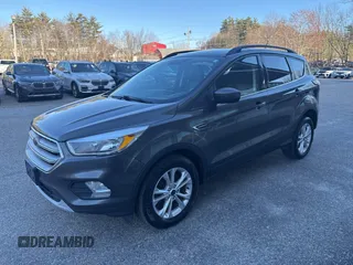 2018 Ford Escape SE with VIN 1FMCU9GD8JUA76991, listed as a IAAI auction lot 42013849 with 213,827 mi miles. Bid and sale history available at carsss.com. Image 2.