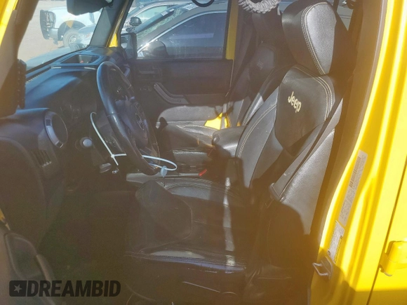 2015 Jeep Wrangler Unlimited Sport with VIN 1C4BJWDG1FL566224, listed as a Copart auction lot 64113195 with 127,445 mi miles and Clean title. Bid and sale history available at DreamBid. Image 7.