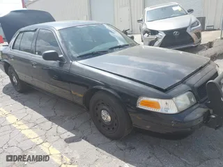 2004 Ford Police Interceptor Base w/3.27 Axle with VIN 2FAFP71W34X136279, listed as a IAAI auction lot 41945086 with 151,350 mi miles. Bid and sale history available at carsss.com. Image 1.