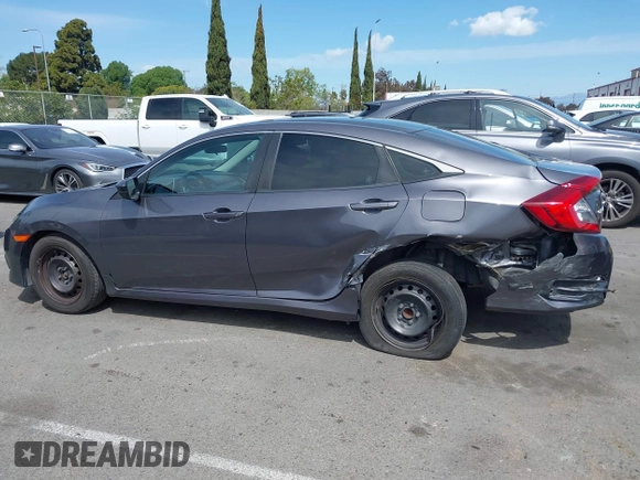 2017 Honda Civic LX with VIN 2HGFC2F52HH566363, listed as a IAAI auction lot 41934807 with 94,063 mi miles and . Bid and sale history available at DreamBid. Image 14.