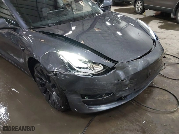 2021 Tesla Model 3 Performance with VIN 5YJ3E1EC3MF044802, listed as a IAAI auction lot 41891096 with 56,001 mi miles. Bid and sale history available at carsss.com. Image 20.