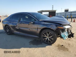 2023 Toyota Camry SE with VIN 4T1G11AK8PU732604, listed as a Copart auction lot 50635685 with 57,364 mi miles and Salvage Title. Bid and sale history available at DreamBid. Image 4.