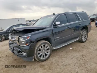 2016 Chevrolet Tahoe LTZ with VIN 1GNSCCKC9GR384849, listed as a Copart auction lot 59056865 with 202,199 mi miles and Salvage title. Bid and sale history available at DreamBid. Image 1.