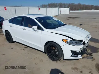 2019 Ford Fusion Titanium with VIN 3FA6P0D98KR241506, listed as a IAAI auction lot 41758064 with 107,816 mi miles and . Bid and sale history available at DreamBid. Image 1.