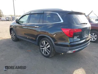 2017 Honda Pilot Touring with VIN 5FNYF6H9XHB062171, listed as a IAAI auction lot 41927969 with 210,633 mi miles. Bid and sale history available at carsss.com. Image 3.