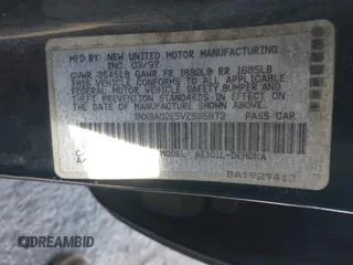 1997 Toyota Corolla with VIN 1NXBA02E5VZ595972, listed as a IAAI auction lot 41622050 with 143,577 mi miles and . Bid and sale history available at DreamBid. Image 9.