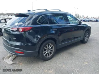 2018 Mazda CX-9 Touring with VIN JM3TCACY9J0234304, listed as a IAAI auction lot 41407496 with 122,824 mi miles. Bid and sale history available at carsss.com. Image 4.