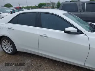 2015 Cadillac CTS Luxury RWD z VIN 1G6AR5S32F0123986, wystawiony jako IAAI lot #41853734 z przebiegiem 108 043 mil mil oraz . Historia ofert i sprzedaży dostępna na DreamBid. Obrazek 13.