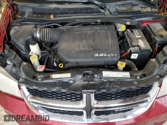 2011 Dodge Grand Caravan Crew with VIN 2D4RN5DG9BR606602, listed as a Copart auction lot 69881504 with 129,575 mi miles and Salvage Title. Bid and sale history available at DreamBid. Image 12.