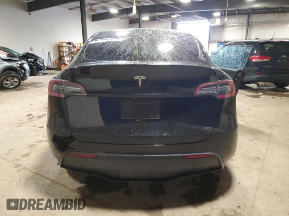 2024 Tesla Model Y с VIN 7SAYGDED0RF084081, выставлен на аукционе Copart как лот 55992195 с пробегом 43 871 миль миль и Списание • Salvage title. История ставок и продаж доступна на DreamBid. Изображение 6.
