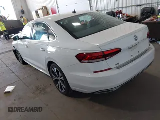 2021 Volkswagen Passat SE with VIN 1VWSA7A30MC014179, listed as a IAAI auction lot 42342358 with 77,535 mi miles and . Bid and sale history available at DreamBid. Image 3.