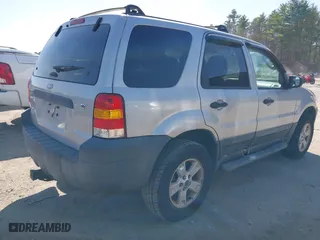2006 Ford Escape XLT with VIN 1FMYU93146KA41949, listed as a IAAI auction lot 42103938 with 138,902 mi miles. Bid and sale history available at carsss.com. Image 4.