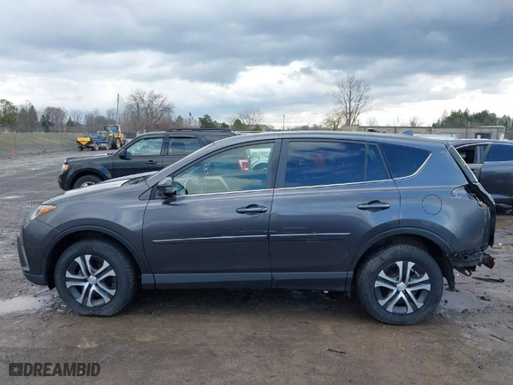 2018 Toyota RAV4 LE with VIN JTMBFREV8JJ184809, listed as a IAAI auction lot 41901048 with 76,699 mi miles. Bid and sale history available at carsss.com. Image 15.