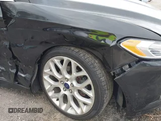 2014 Ford Fusion Titanium with VIN 3FA6P0K92ER355539, listed as a IAAI auction lot 41851471 with 178,176 mi miles and . Bid and sale history available at DreamBid. Image 12.