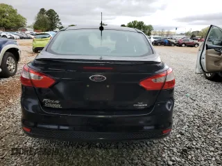 2013 Ford Focus SE z VIN 1FADP3F24DL216824, wystawiony jako Copart lot #52142715 z przebiegiem 149 611 mil mil oraz Szkoda całkowita • Salvage title. Historia ofert i sprzedaży dostępna na DreamBid. Obrazek 6.