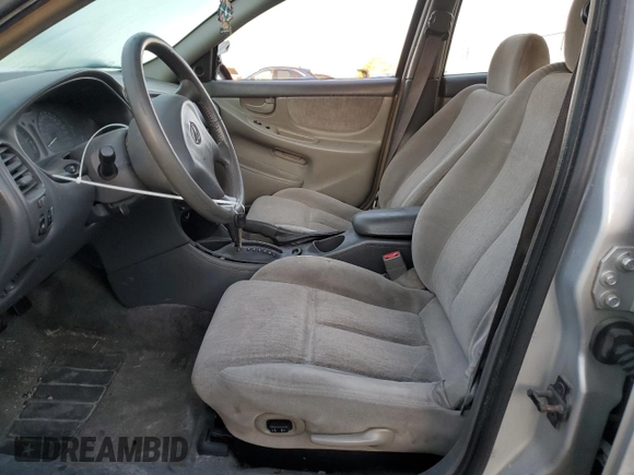2003 Oldsmobile Alero GL1 z VIN 1G3NL52F13C182905, wystawiony jako Copart lot #77264384 z przebiegiem Nie podano mil oraz Szkoda całkowita • Salvage title. Historia ofert i sprzedaży dostępna na DreamBid. Obrazek 7.