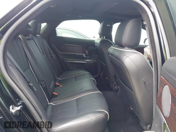2011 Jaguar XJ with VIN SAJWA1CB3BLV07259, listed as a IAAI auction lot 42108497 with 90,498 mi miles and . Bid and sale history available at DreamBid. Image 8.