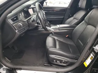 2013 BMW 7 Series 740Li with VIN WBAYE4C51DD137687, listed as a Copart auction lot 76103944 with 134,609 mi miles and Salvage Title. Bid and sale history available at carsss.com. Image 7.