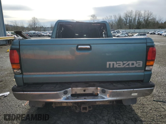 1994 Mazda B-Series Truck LE z VIN 4F4DR17X5RTN10704, wystawiony jako Copart lot #87230804 z przebiegiem 227 476 mil mil oraz Szkoda całkowita • Salvage title. Historia ofert i sprzedaży dostępna na DreamBid. Obrazek 6.