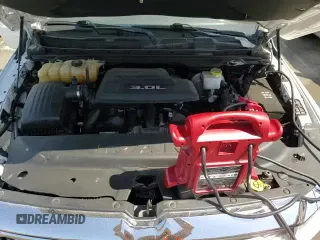 2020 Ram 1500 Laramie z VIN 1C6SRFJM6LN208434, wystawiony jako Copart lot #58059085 z przebiegiem 64 786 mil mil oraz Szkoda całkowita • Salvage title. Historia ofert i sprzedaży dostępna na DreamBid. Obrazek 13.