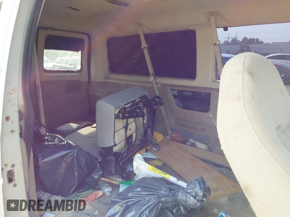 2005 Ford Econoline Passenger XL with VIN 1FMRE11W15HA64778, listed as a IAAI auction lot 42397426 with 330,632 mi miles and . Bid and sale history available at DreamBid. Image 8.