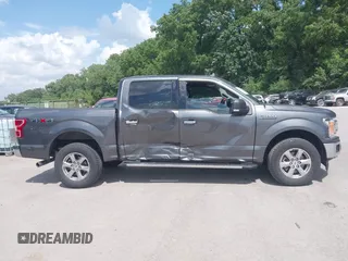 2018 Ford F-150 XL with VIN 1FTEW1E57JFA95086, listed as a IAAI auction lot 42574704 with 77,301 mi miles and . Bid and sale history available at DreamBid. Image 13.