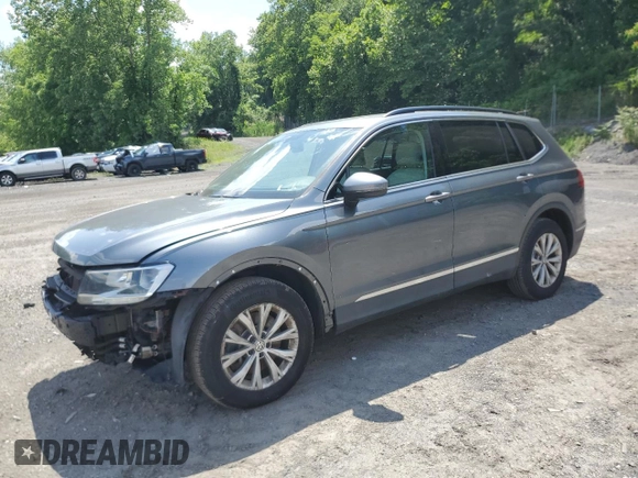 2018 Volkswagen Tiguan SEL with VIN 3VV2B7AXXJM060858, listed as a Copart auction lot 60639885 with 119,148 mi miles and Salvage title. Bid and sale history available at DreamBid. Image 1.