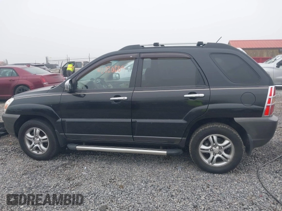 2008 Kia Sportage LX with VIN KNDJE723987527110, listed as a IAAI auction lot 42020008 with 197,810 mi miles and . Bid and sale history available at DreamBid. Image 14.