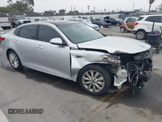 2016 Kia Optima EX z VIN 5XXGU4L32GG055154, wystawiony jako IAAI lot #42450706 z przebiegiem 90 538 mil mil oraz . Historia ofert i sprzedaży dostępna na DreamBid. Obrazek 1.