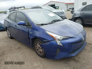 2016 Toyota Prius Four z VIN JTDKARFU0G3521054, wystawiony jako IAAI lot #41908181 z przebiegiem 298 957 mil mil oraz . Historia ofert i sprzedaży dostępna na DreamBid. Obrazek 1.