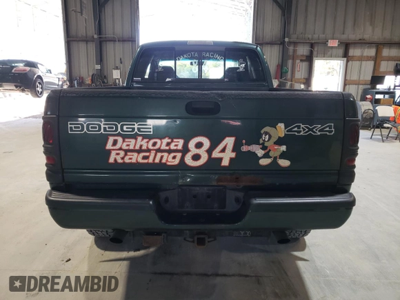 2000 Dodge 1500 z VIN 3B7HF13Z0YG125699, wystawiony jako Copart lot #78959104 z przebiegiem Nie podano mil oraz Szkoda całkowita • Salvage title. Historia ofert i sprzedaży dostępna na DreamBid. Obrazek 6.