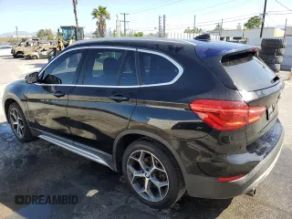 2017 BMW X1 sDrive28i z VIN WBXHU7C34HP924632, wystawiony jako Copart lot #56169005 z przebiegiem 203 811 mil mil oraz Czysty tytuł • Clean title. Historia ofert i sprzedaży dostępna na DreamBid. Obrazek 2.