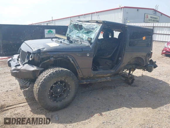 2014 Jeep Wrangler Sport with VIN 1C4AJWAGXEL233647, listed as a IAAI auction lot 39993785 with Not Provided miles and . Bid and sale history available at DreamBid. Image 23.