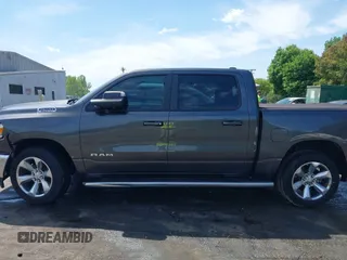 2021 Ram 1500 Big Horn z VIN 1C6RREFM5MN813578, wystawiony jako IAAI lot #42066531 z przebiegiem 77 207 mil mil oraz . Historia ofert i sprzedaży dostępna na DreamBid. Obrazek 13.