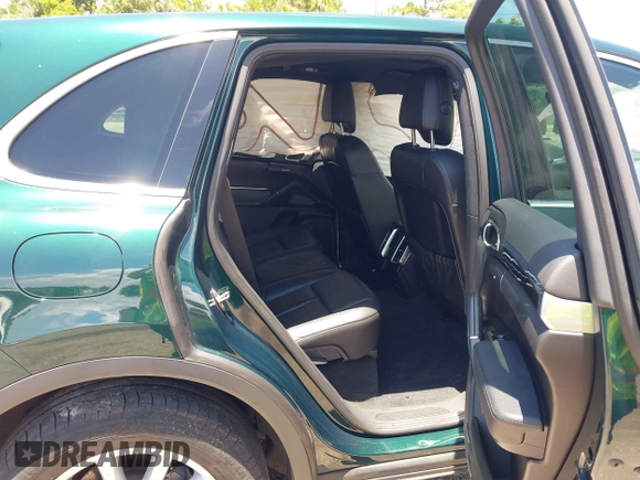2014 Porsche Cayenne with VIN WP1AA2A21ELA06570, listed as a IAAI auction lot 42473298 with 61,421 mi miles and . Bid and sale history available at DreamBid. Image 8.
