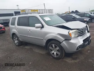 2013 Honda Pilot Touring z VIN 5FNYF4H96DB051005, wystawiony jako IAAI lot #42211189 z przebiegiem 215 594 mil mil oraz . Historia ofert i sprzedaży dostępna na DreamBid. Obrazek 1.