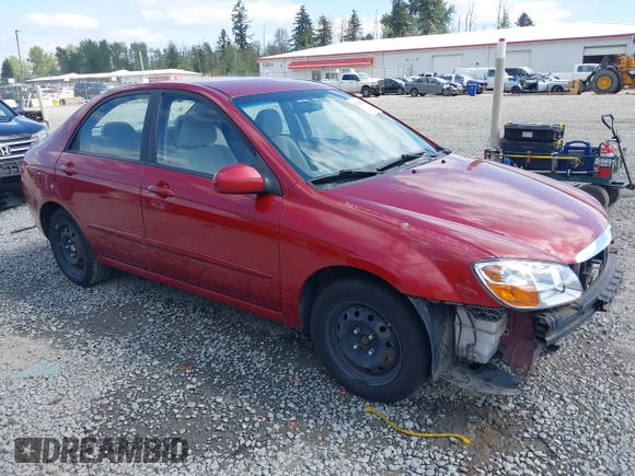 2009 Kia Spectra EX with VIN KNAFE222195661572, listed as a IAAI auction lot 42148750 with 137,773 mi miles. Bid and sale history available at carsss.com. Image 1.