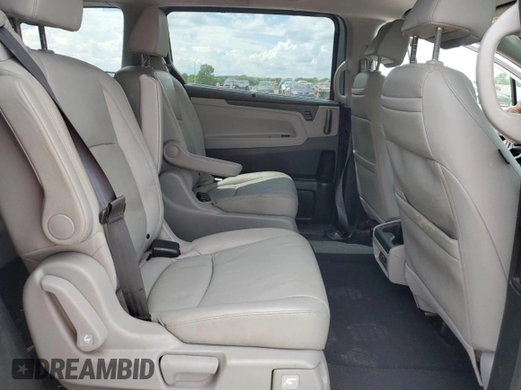 2018 Honda Odyssey EX-L с VIN 5FNRL6H79JB073261, выставлен на аукционе Copart как лот 56923075 с пробегом 84 009 миль миль и Списание • Salvage title. История ставок и продаж доступна на DreamBid. Изображение 11.
