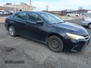 2015 Toyota Camry LE with VIN 4T1BD1FK3FU164092, listed as a IAAI auction lot 41886726 with 396,189 mi miles and . Bid and sale history available at DreamBid. Image 1.
