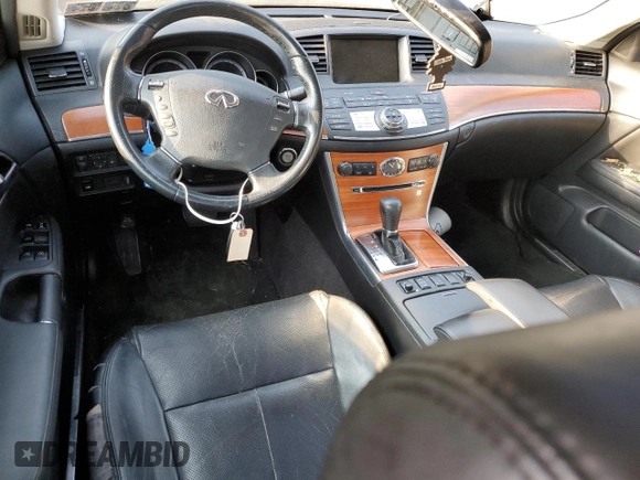 2007 Infiniti M x with VIN JNKAY01F77M460855, listed as a Copart auction lot 71068154 with 225,217 mi miles and Salvage Title. Bid and sale history available at DreamBid. Image 8.