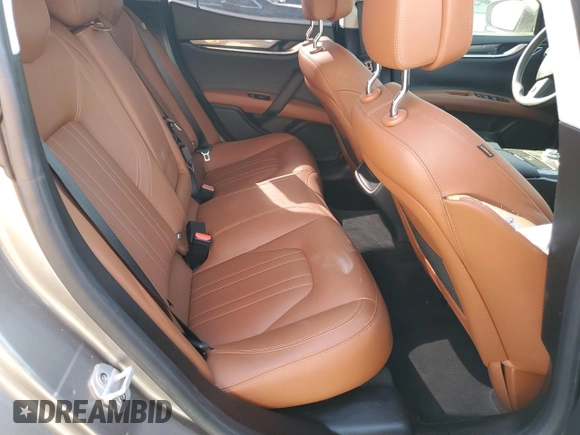 2019 Maserati Ghibli z VIN ZAM57XSA4K1315392, wystawiony jako Copart lot #67172684 z przebiegiem 30 544 mil mil oraz Szkody całkowita. Historia ofert i sprzedaży dostępna na DreamBid. Obrazek 10.