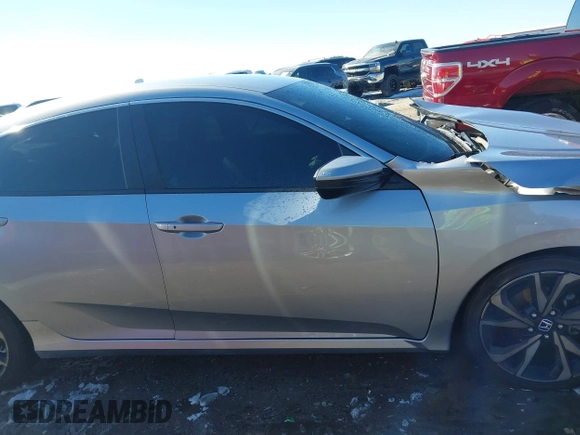 2019 Honda Civic Sport with VIN 2HGFC2F85KH605786, listed as a IAAI auction lot 41621480 with 66,438 mi miles and . Bid and sale history available at DreamBid. Image 14.