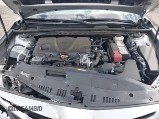 2018 Toyota Camry LE z VIN 4T1B11HK8JU649942, wystawiony jako IAAI lot #42194030 z przebiegiem 54 687 mil mil oraz . Historia ofert i sprzedaży dostępna na DreamBid. Obrazek 10.