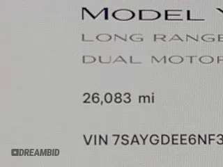 2022 Tesla Model Y Long Range with VIN 7SAYGDEE6NF318372, listed as a IAAI auction lot 41526857 with 26,083 mi miles and . Bid and sale history available at carsss.com. Image 15.