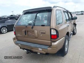 2000 Isuzu Rodeo S with VIN 4S2CK58W3Y4316966, listed as a IAAI auction lot 42003598 with 106,187 mi miles and . Bid and sale history available at carsss.com. Image 16.