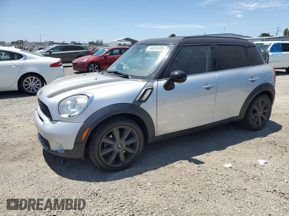 2013 MINI Countryman S with VIN WMWZC3C58DWP20864, listed as a Copart auction lot 64034385 with 72,487 mi miles and Clean title. Bid and sale history available at DreamBid. Image 1.