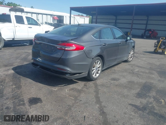2017 Ford Fusion SE z VIN 3FA6P0H76HR259097, wystawiony jako IAAI lot #42133090 z przebiegiem 187 400 mil mil oraz . Historia ofert i sprzedaży dostępna na DreamBid. Obrazek 4.